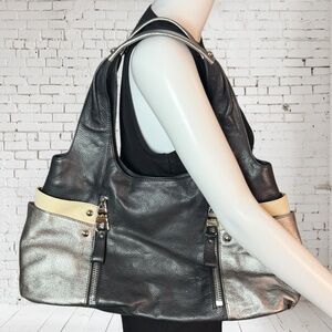 Black and silver leather purse by B. Makowsky Zippers and Leopard print interior